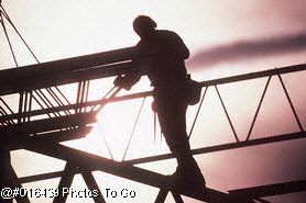 Silhouette of construction worker on site